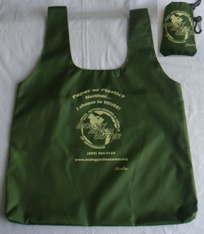 Green tote bag with the Ecology Action Center logo.