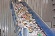 Conveyor belts move the recyclable waste through the sorting process.