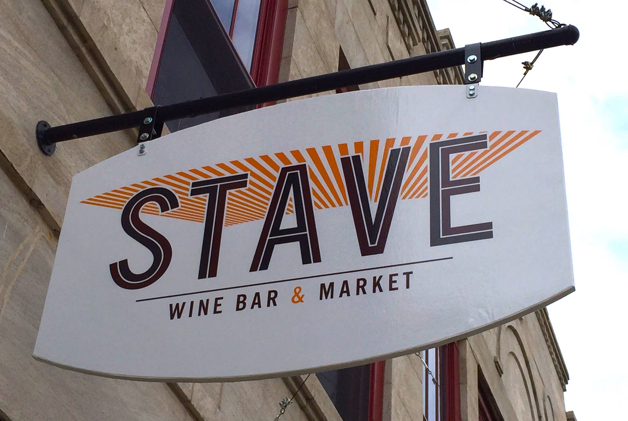 Stave Wine Bar & Market sign in front of the building.