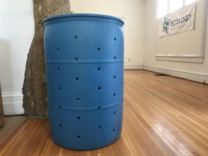 Blue compost bin made from repurposed 55 gallon drum