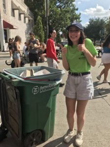 Volunteer helping compost at Sweet Corn Circus