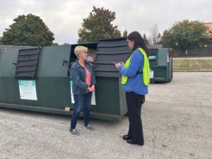 EAC staff member conducting the recycling drop box user survey 